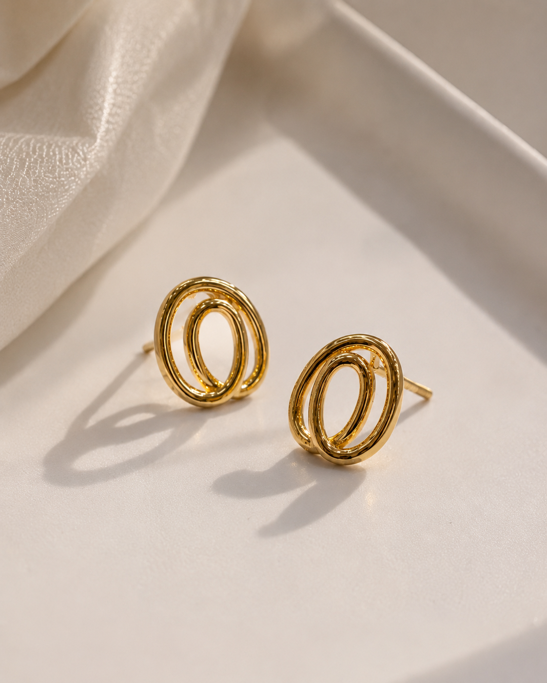 9K Gold Interlocking Oval Stud Earrings