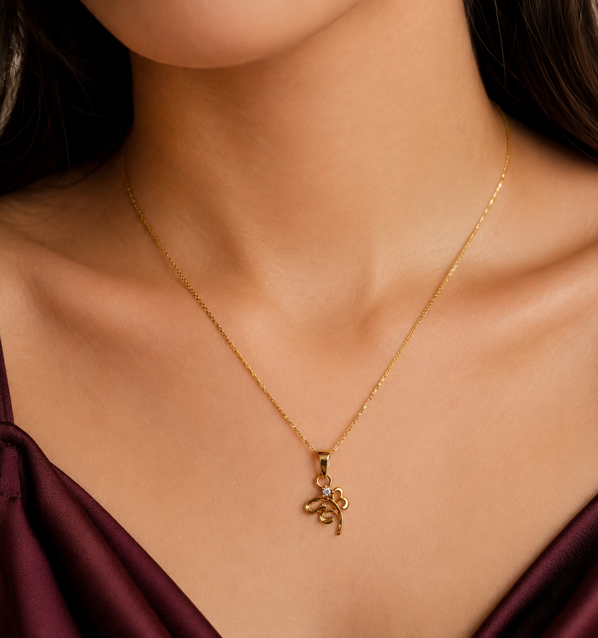 9K Gold Elegant Swirl Pendant