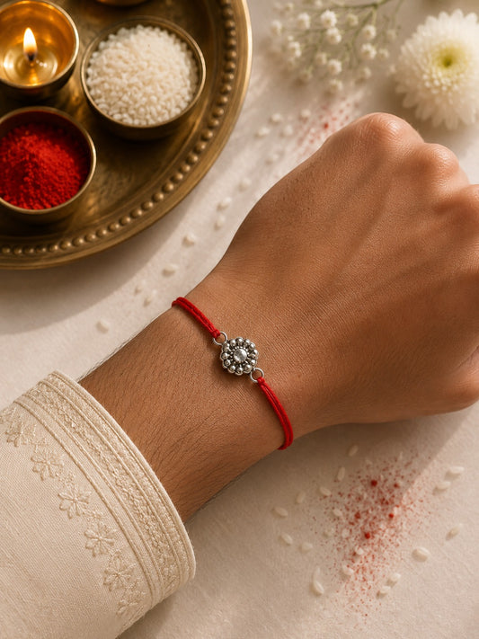 Elegant Red Thread Floral Rakhi