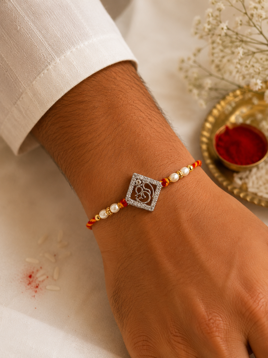 Divine Om Pearl Rakhi