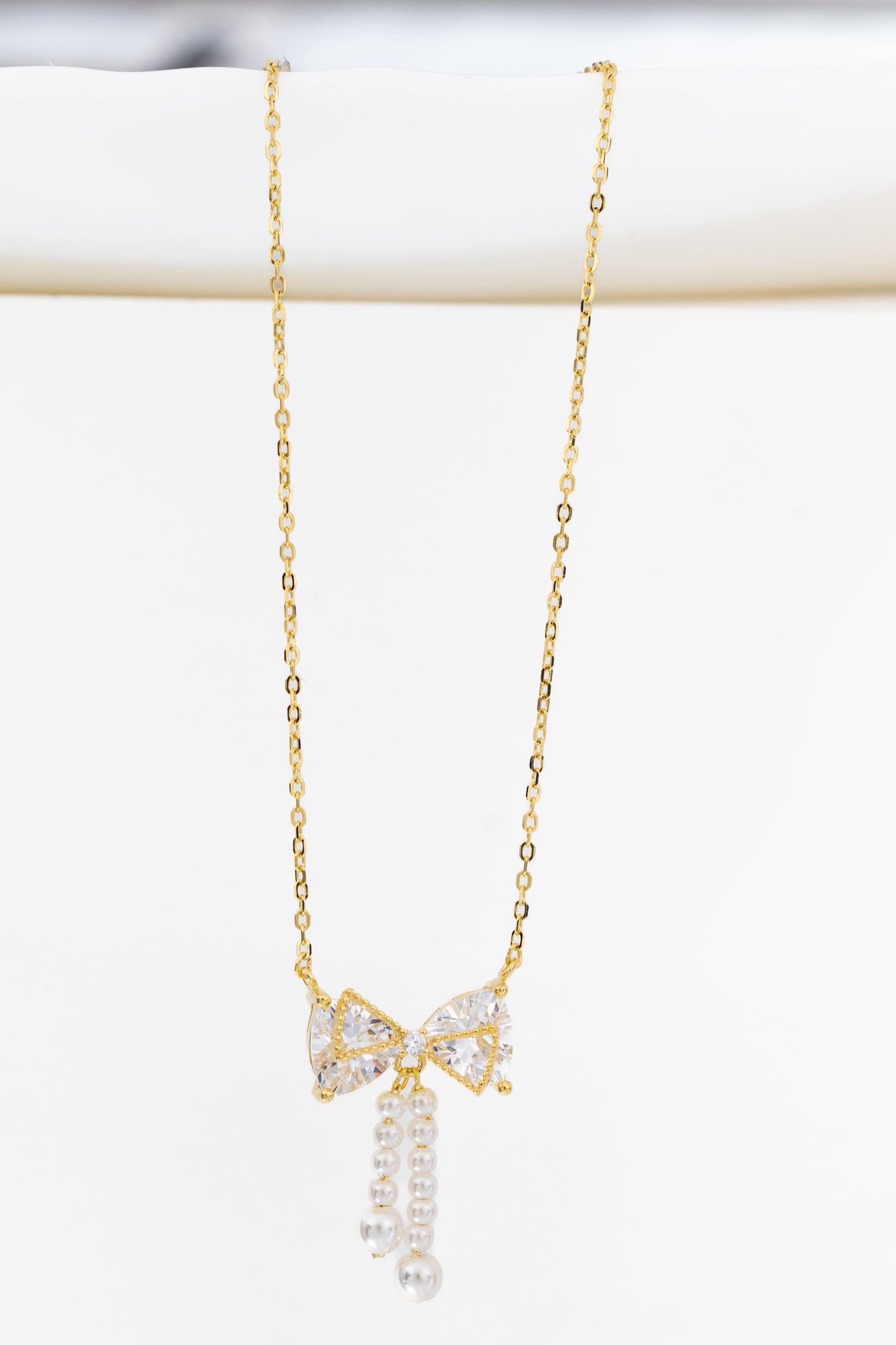 GlamBow Pearl Tassel Necklace