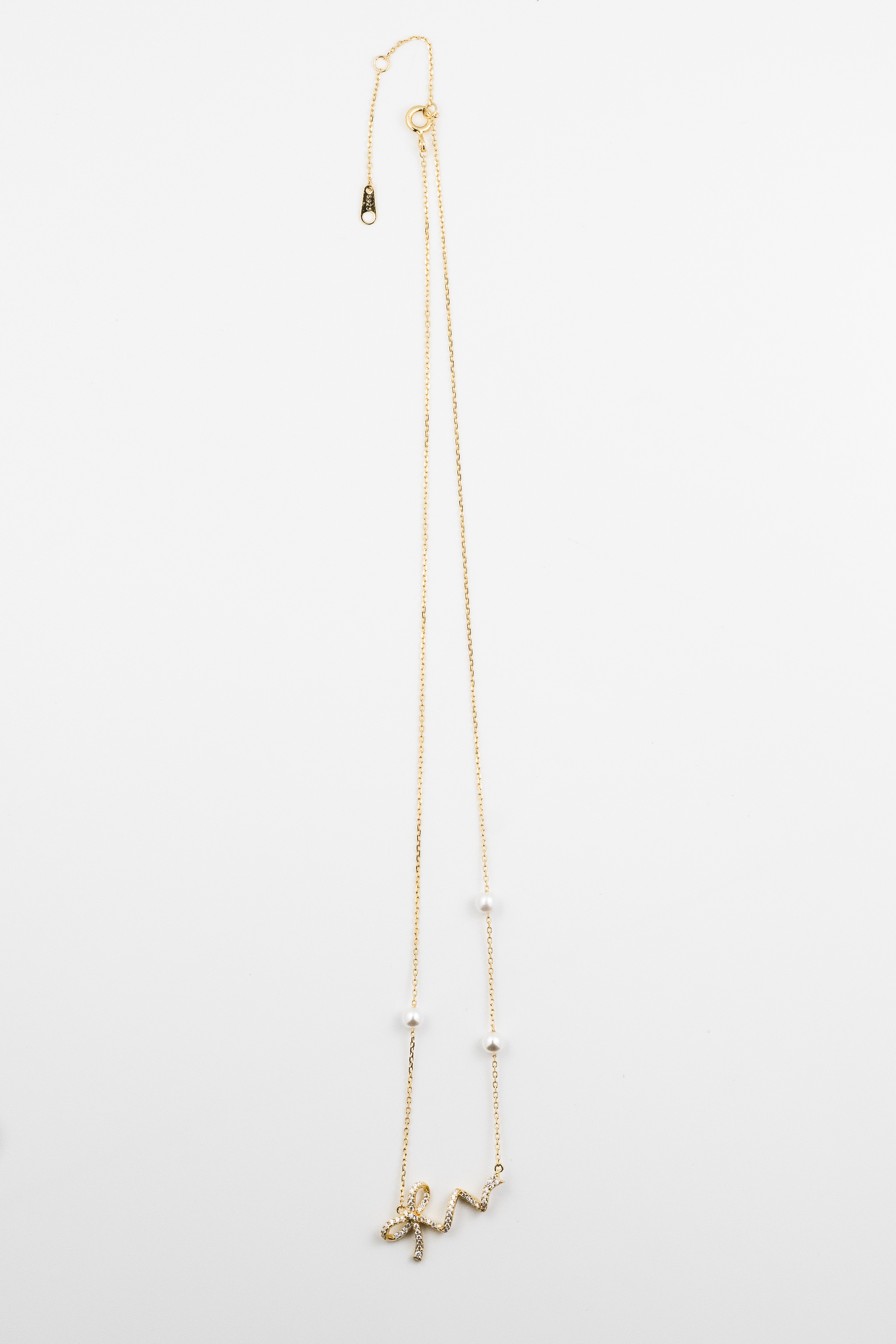 Golden Ribbon Pearl Charm Necklace