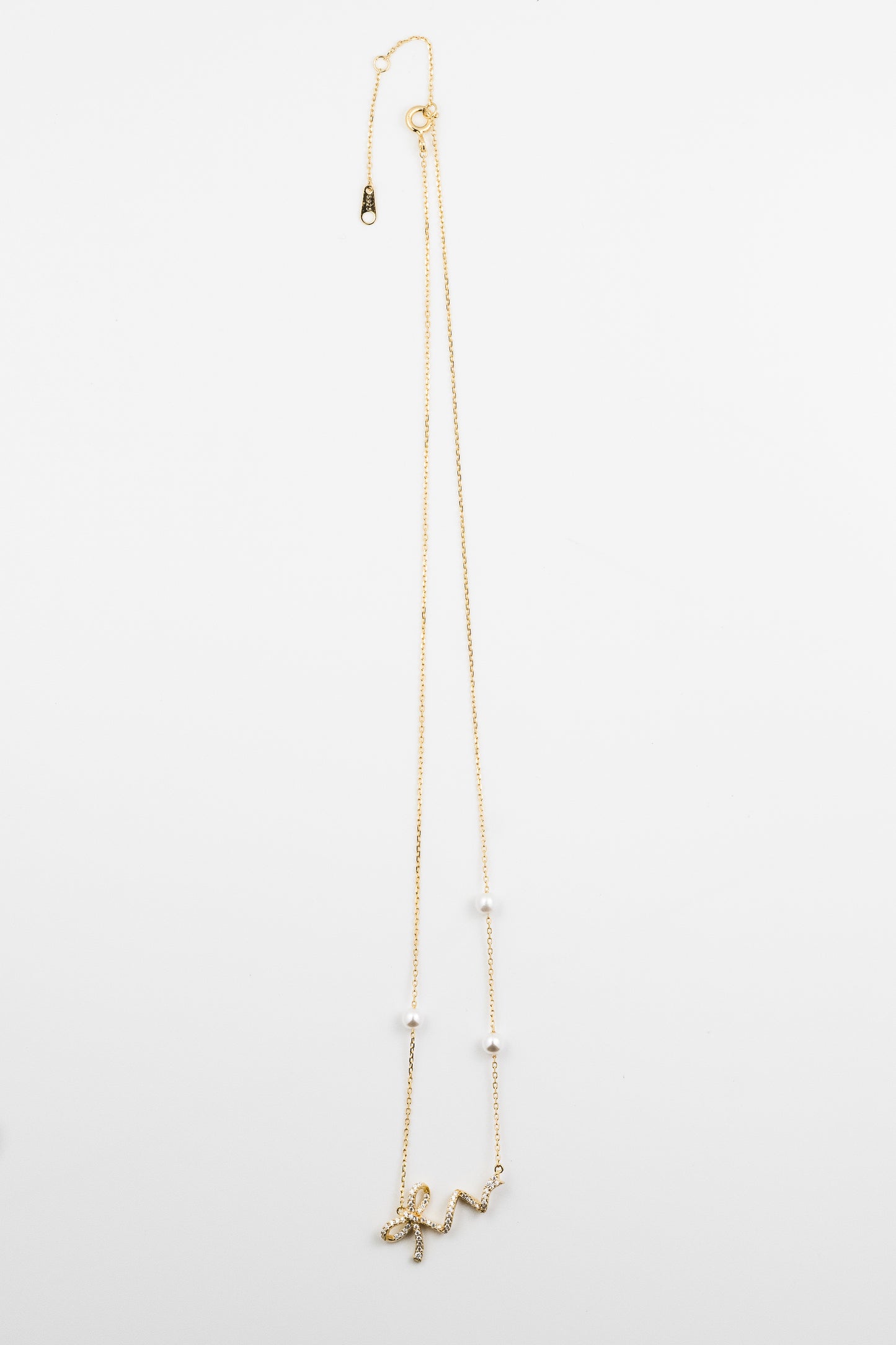 Golden Ribbon Pearl Charm Necklace