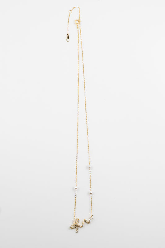 Golden Ribbon Pearl Charm Necklace
