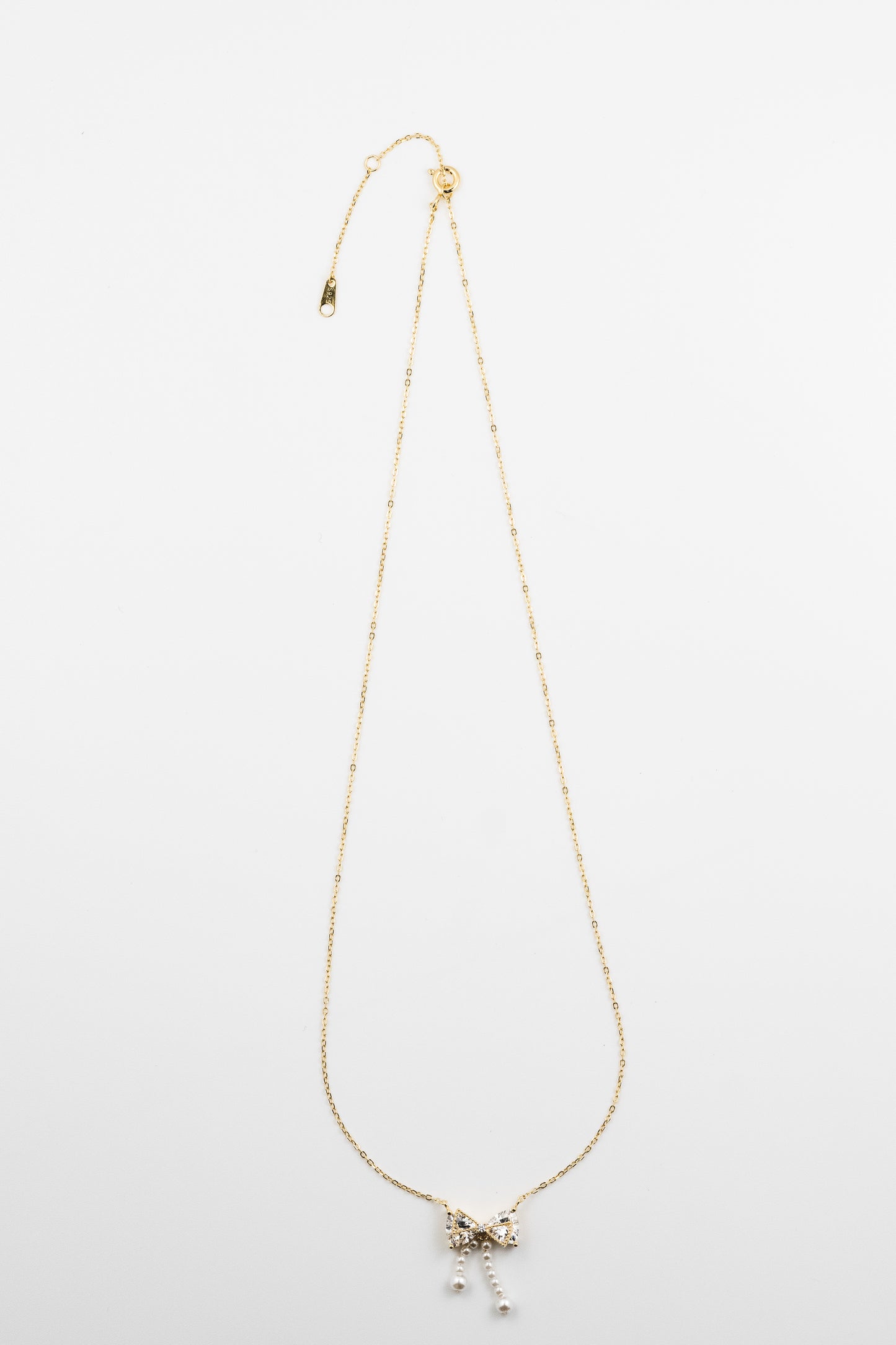 GlamBow Pearl Tassel Necklace