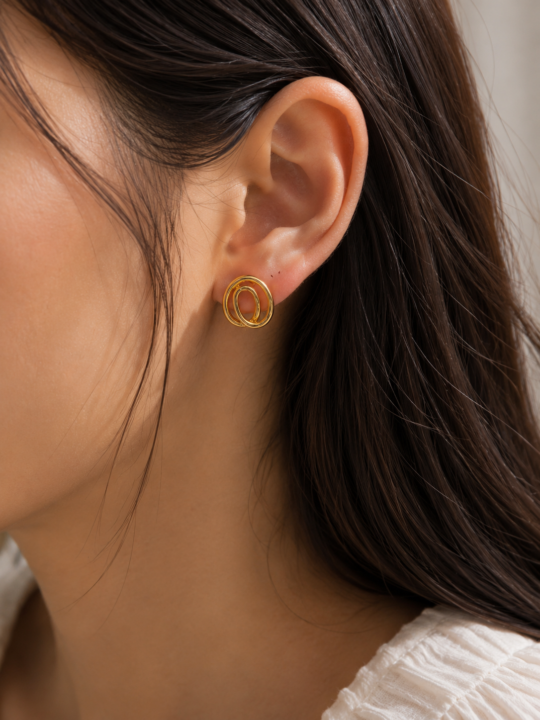 9K Gold Interlocking Oval Stud Earrings