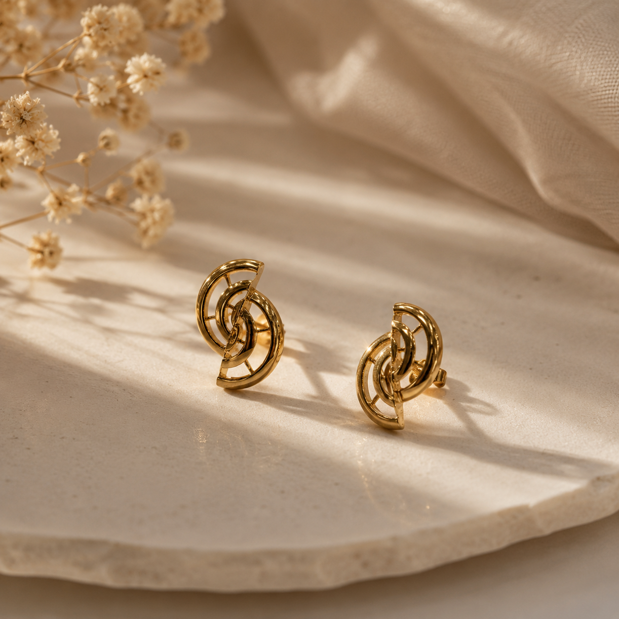 9K Gold Interlocking Circle Designer Stud Earrings